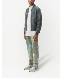 Jean imprimé tie-dye olive John Elliott