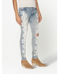 Jean skinny à fleurs bleu clair Amiri