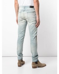 Jean skinny à patchwork bleu clair Amiri