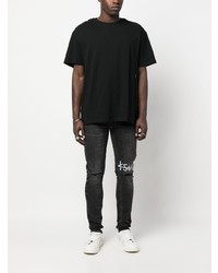 Jean skinny déchiré noir Ksubi