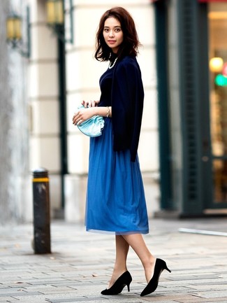 Comment porter une pochette en cuir turquoise