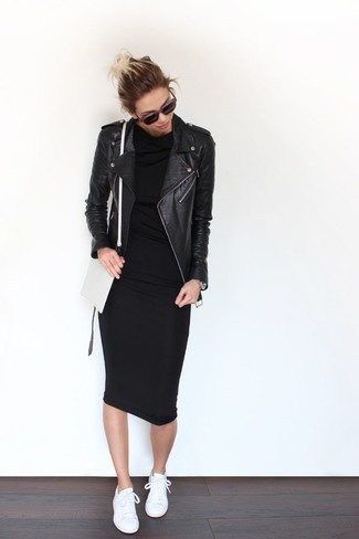 Comment porter une robe moulante noire