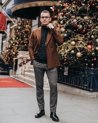 Des bottines chelsea à porter avec une veste sans manches noire
