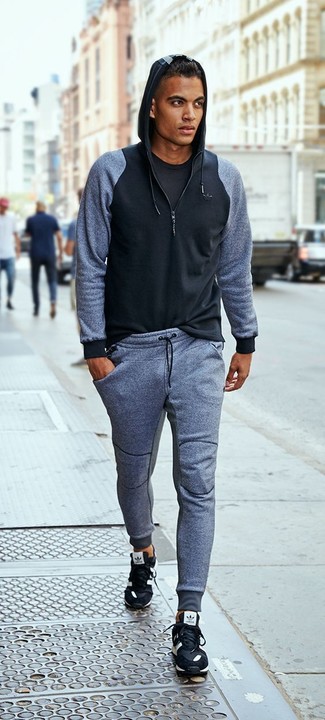 Comment porter un sweat à capuche noir pour un style relax