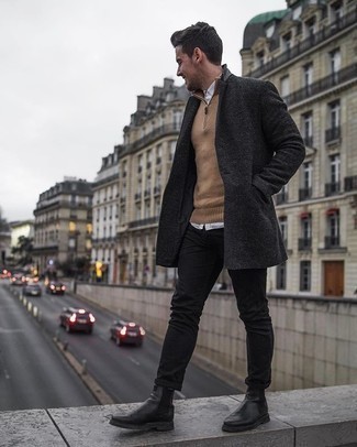 Un pull à col à fermeture éclair à porter avec un jean noir
