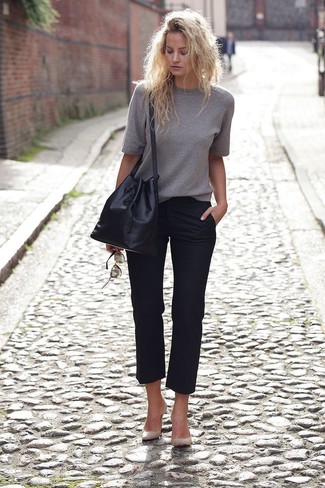 Comment porter un sac bourse en cuir noir