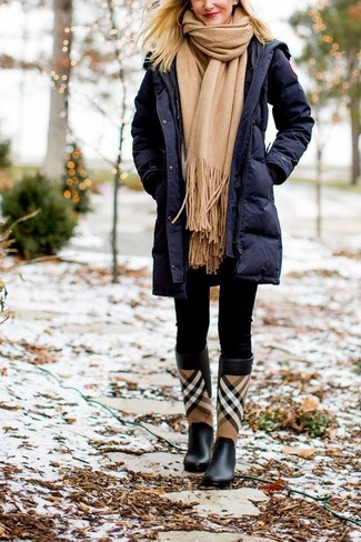Comment porter des leggings noirs pour un style relax quand il fait froid à 30 ans