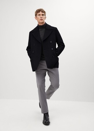 Un pull à col roulé à porter avec un caban noir