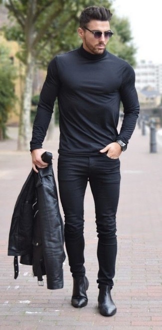 Un pull à col roulé à porter avec un jean skinny noir