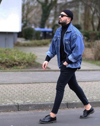 Un pull à col roulé à porter avec un jean skinny noir