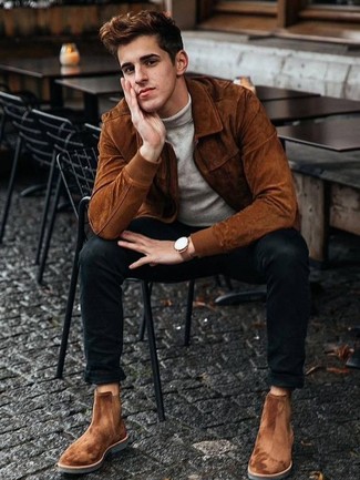 Un pull à col roulé à porter avec un jean skinny noir
