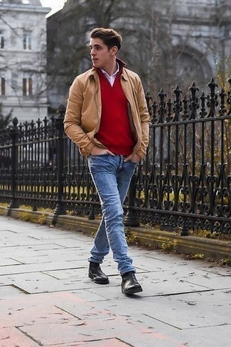 Une veste harrington à porter avec un jean bleu