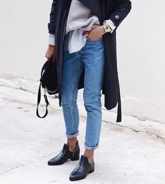 Un pull surdimensionné à porter avec un jean bleu