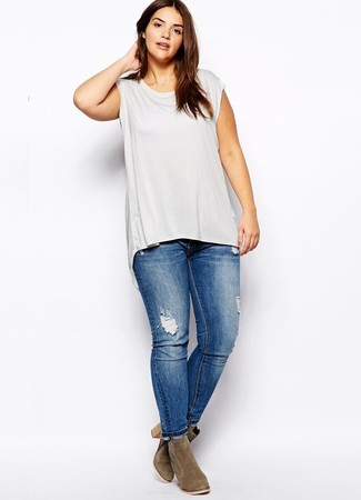Comment porter un jean déchiré bleu en automne