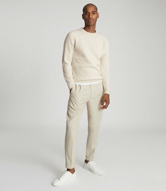 Comment porter un pull torsadé