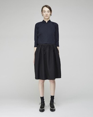 Jupe mi-longue plissée noire Yves Saint Laurent Vintage