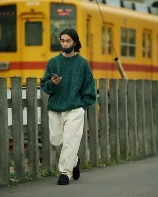 Comment porter un pull torsadé vert foncé