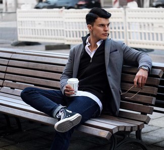Un jean à porter avec un blazer gris