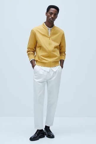 Comment porter un blouson aviateur orange pour un style chic decontractés