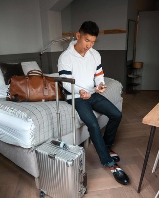 Comment porter une valise pour un style chic decontractés au printemps