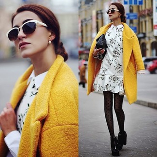 Comment porter une robe blanche avec des bottes noires pour un style elégantes