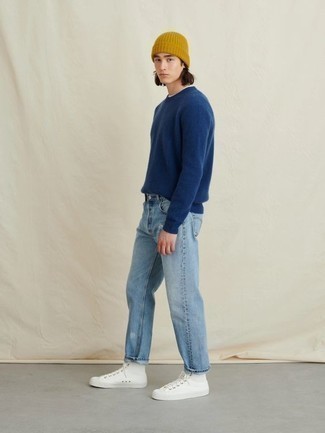 Comment porter des chaussures blanches avec un jean bleu clair