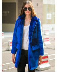 Manteau de fourrure bleu