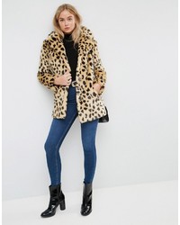 Manteau de fourrure imprimé léopard beige