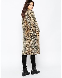 Manteau de fourrure imprimé léopard marron clair