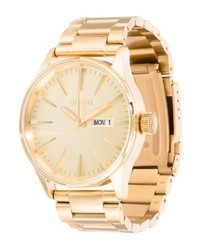 Montre dorée Nixon