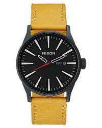 Montre jaune Nixon