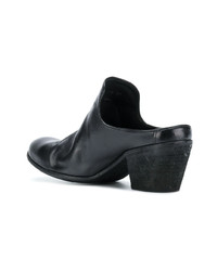 Mules en cuir noires Officine Creative