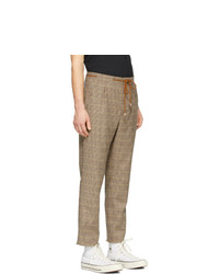 Pantalon chino en laine à carreaux marron clair Nanushka