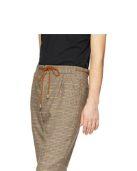 Pantalon chino en laine à carreaux marron clair Nanushka