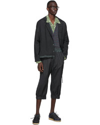Pantalon chino en laine à rayures verticales noir By Walid