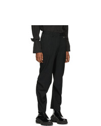 Pantalon chino en laine à rayures verticales noir We11done