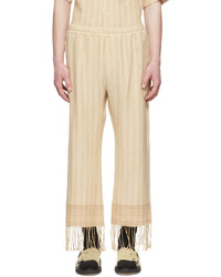 Pantalon chino en lin à rayures verticales beige Cmmn Swdn
