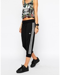 Pantalon de jogging à rayures verticales noir et blanc adidas
