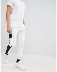 Pantalon de jogging blanc et noir ASOS DESIGN