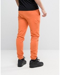 Pantalon de jogging orange Asos