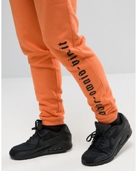 Pantalon de jogging orange Asos