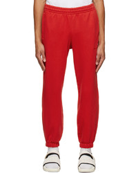 Pantalon de jogging rouge adidas x Humanrace by Pharrell Williams