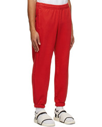 Pantalon de jogging rouge adidas x Humanrace by Pharrell Williams