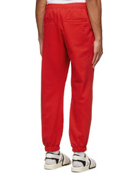 Pantalon de jogging rouge adidas x Humanrace by Pharrell Williams