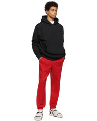 Pantalon de jogging rouge adidas x Humanrace by Pharrell Williams