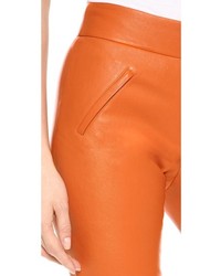 Pantalon slim en cuir orange