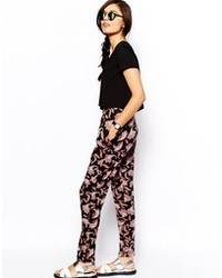 Pantalon style pyjama à fleurs noir Asos
