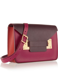 Pochette en cuir bordeaux Sophie Hulme