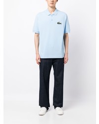 Polo brodé bleu clair Lacoste