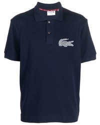 Polo brodé bleu marine Lacoste